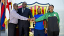 Els representants d'Olympafrica a l'entrada de les oficines del FCB. FOTO: ÀLEX CAPARRÓS / FCB