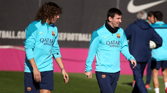 Carles Puyol i Leo Messi, a l'entrenament d'aquest divendres / FOTO: MIGUEL RUIZ - FCB