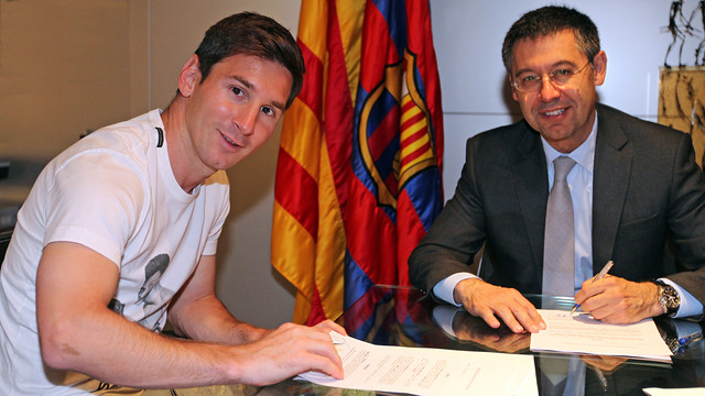 Messi y Josep Maria Bartomeu