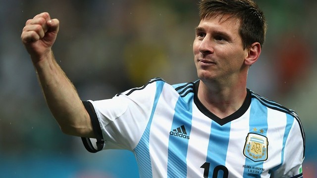 Messi, with his fist raised